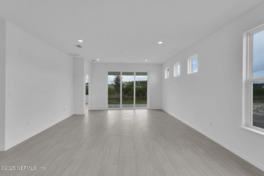 Spacious, unfurnished interior of a new home in Del Webb Wildlight, Yulee (Image 29).