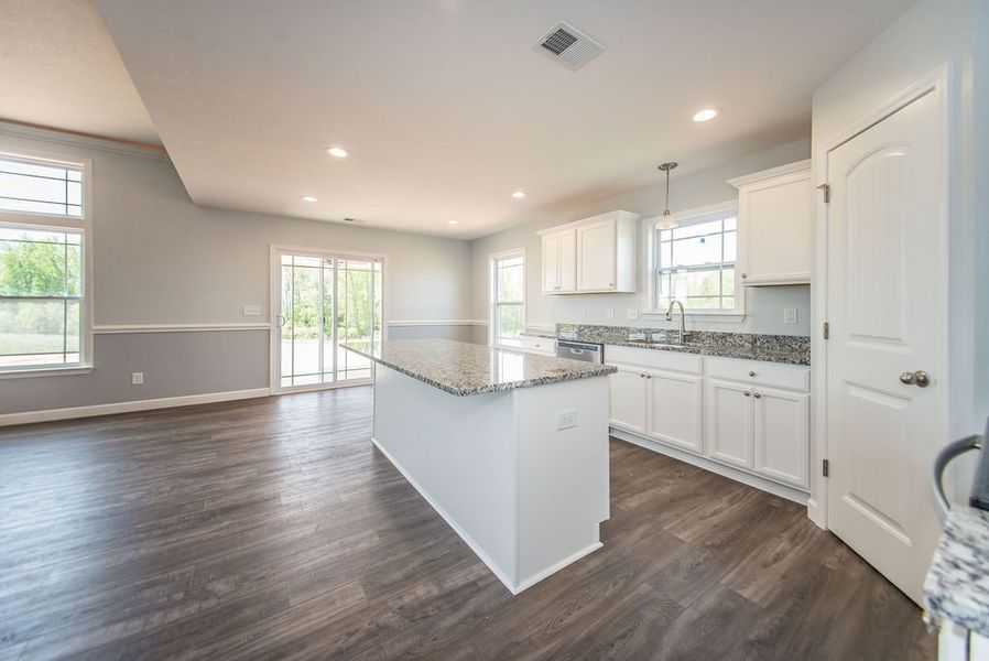 Representative furnished interior of a home built from the Franklin by Enchanted Homes in Guadalupe Heights, Seguin (Image 13).