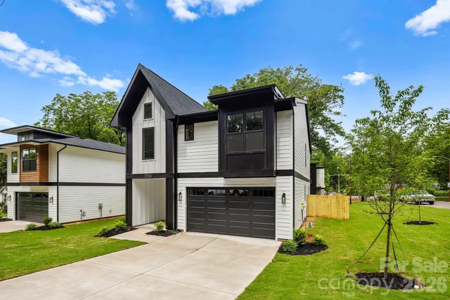Front exterior of a new home in , Charlotte, NC, highlighting curb appeal (Image 27).