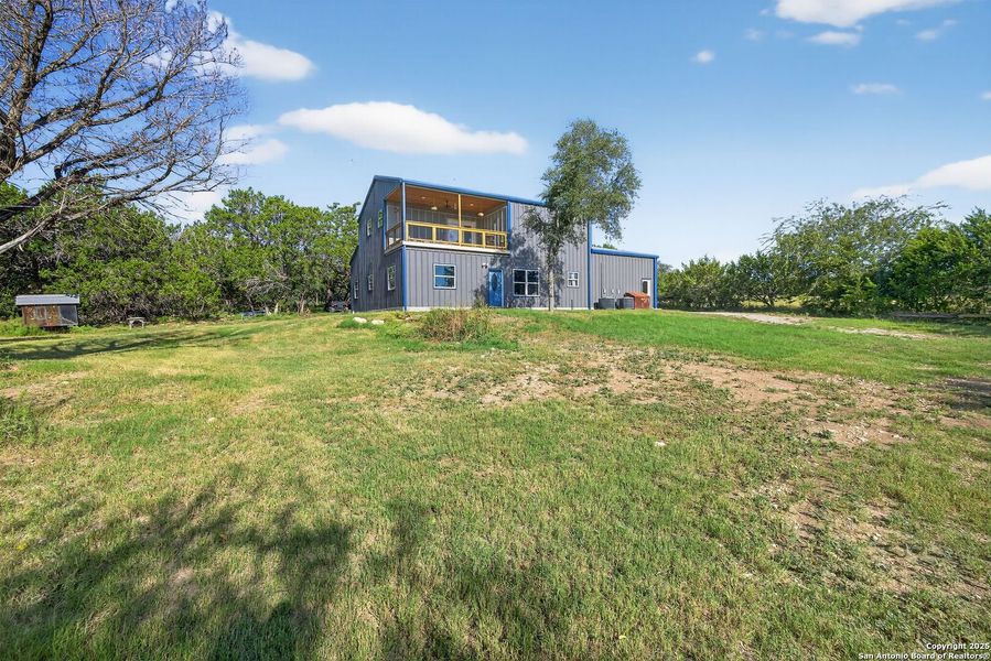 Front exterior of a new home in , Bandera, TX, highlighting curb appeal (Image 19). Front exterior of a new home in , Bandera, TX, highlighting curb appeal (Image 19).