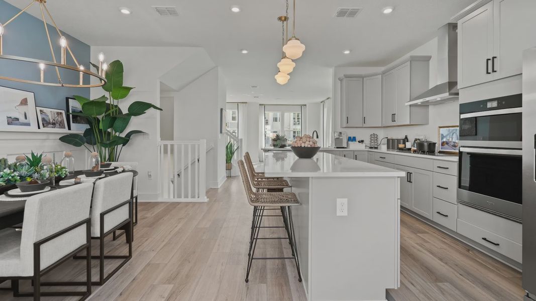 Furnished interior view inside a new home in Parkview at Hamlin, Winter Garden (Image 18).