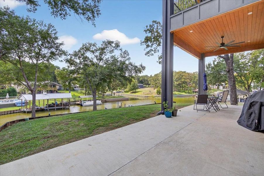 Outdoor living space designed for relaxing and entertaining by the water