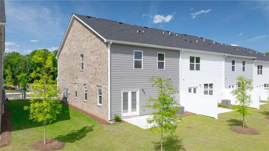 Exterior details and patio area of a home in Echo Glen, Stockbridge (Image 9).