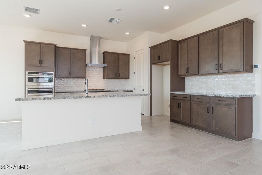 Tri Pointe Soleo 649 - Kitchen-1MLS