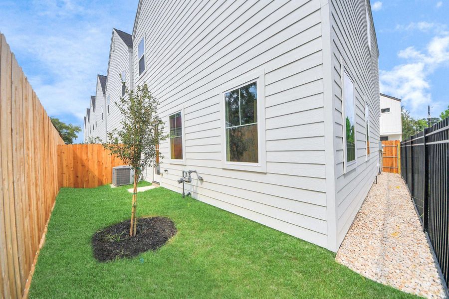 Front exterior of a new home in Highland Gardens, Houston, TX, highlighting curb appeal (Image 9). Front exterior of a new home in Highland Gardens, Houston, TX, highlighting curb appeal (Image 9).