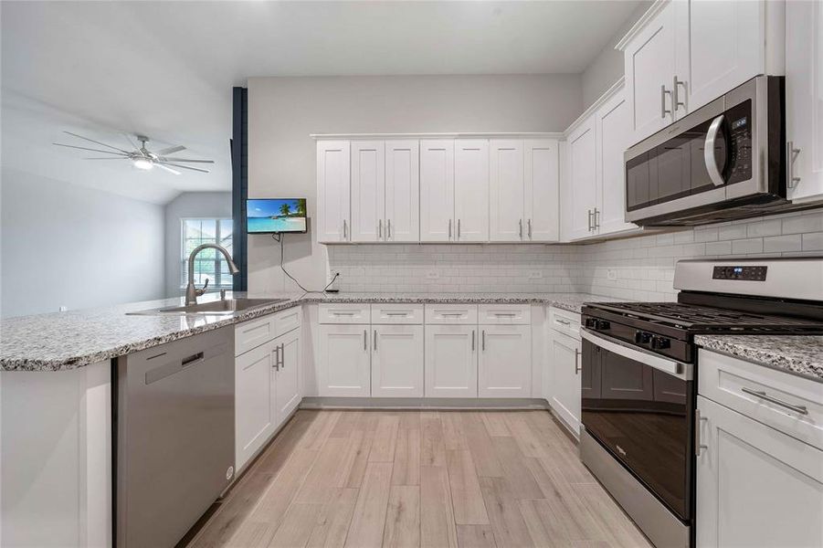 Furnished interior view inside a new home in Heritage Village, Haltom City (Image 7).