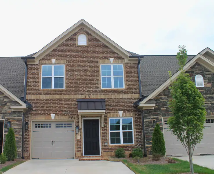 Front exterior of a new home in Weybridge, Burlington, NC, highlighting curb appeal (Image 1). Front exterior of a new home in Weybridge, Burlington, NC, highlighting curb appeal (Image 1).