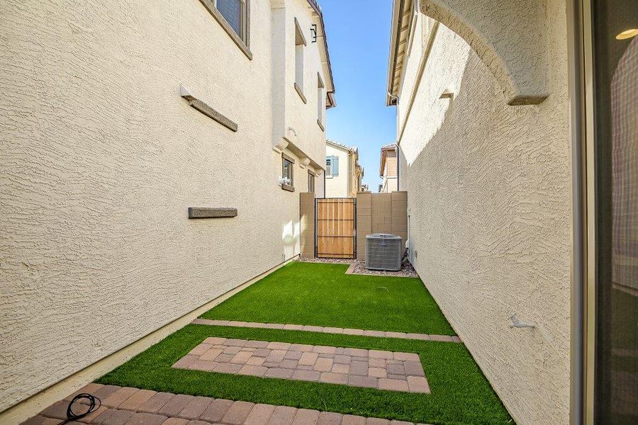 Exterior details and patio area of a home in Ironwood Villages at North Creek, Queen Creek (Image 18).