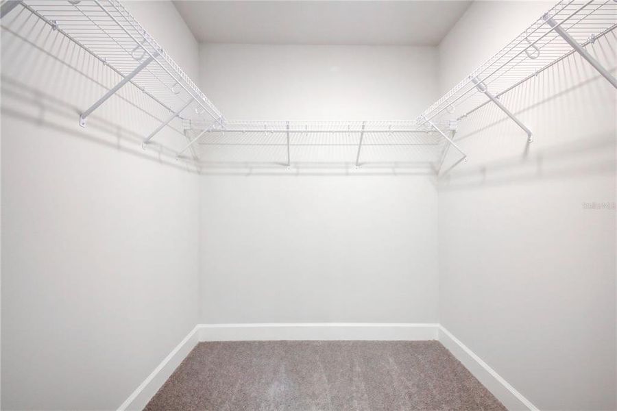 Spacious, unfurnished interior of a new home in Aviary at Rutland Ranch, Parrish (Image 21).