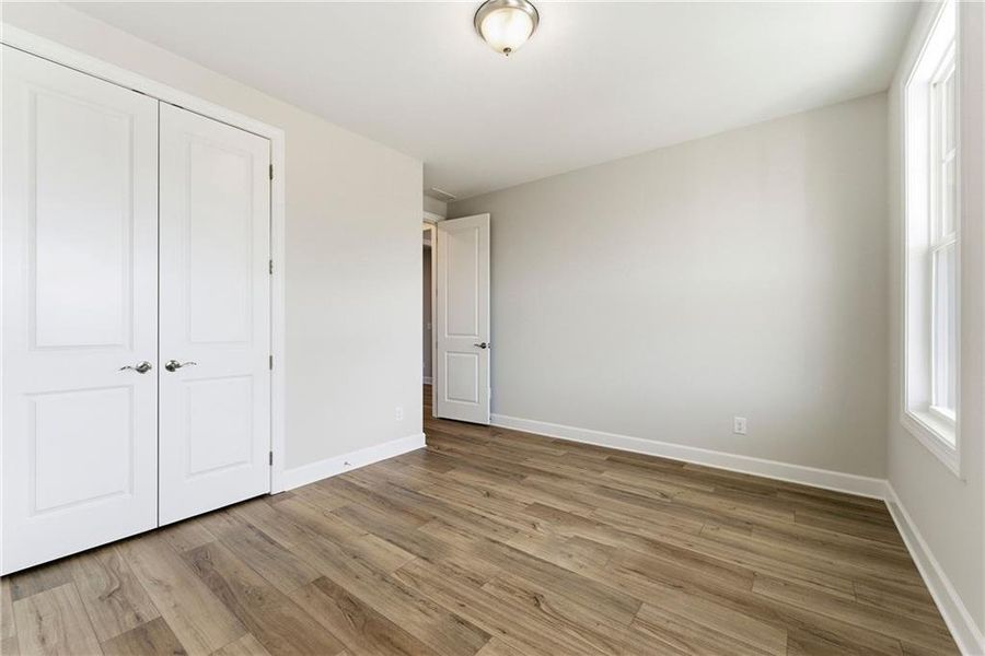 Spacious, unfurnished interior of a new home in Cresswind Georgia at Twin Lakes, Hoschton (Image 25).