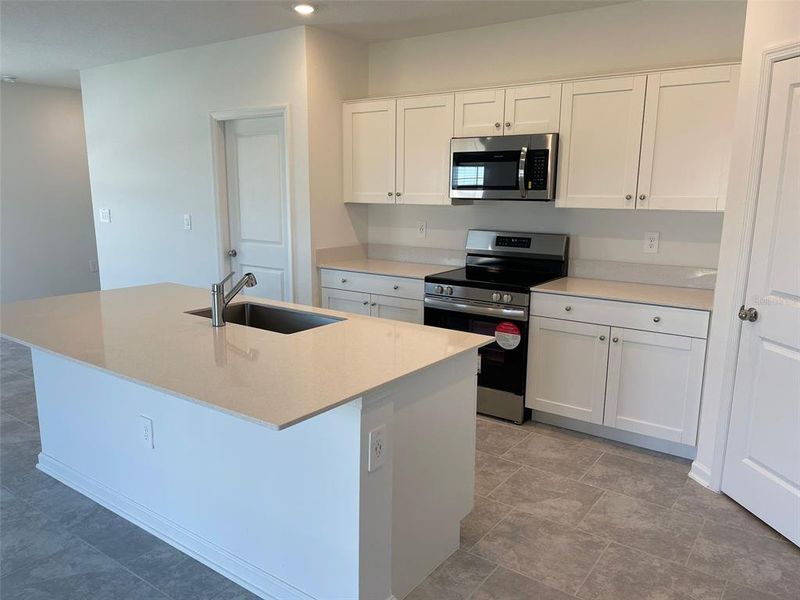Furnished interior view inside a new home in Lawson Dunes, Haines City (Image 7).