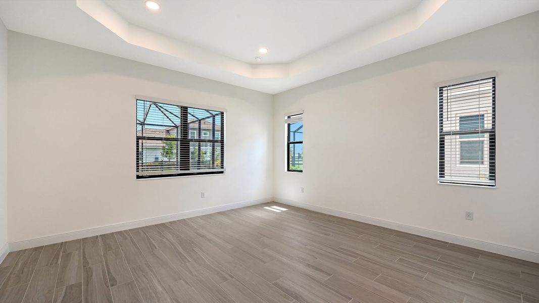 Spacious, unfurnished interior of a new home in Palm Grove Real Estate and Homes for Sale in Lakewood Ranch, FL - Neal Communities, Bradenton (Image 25).