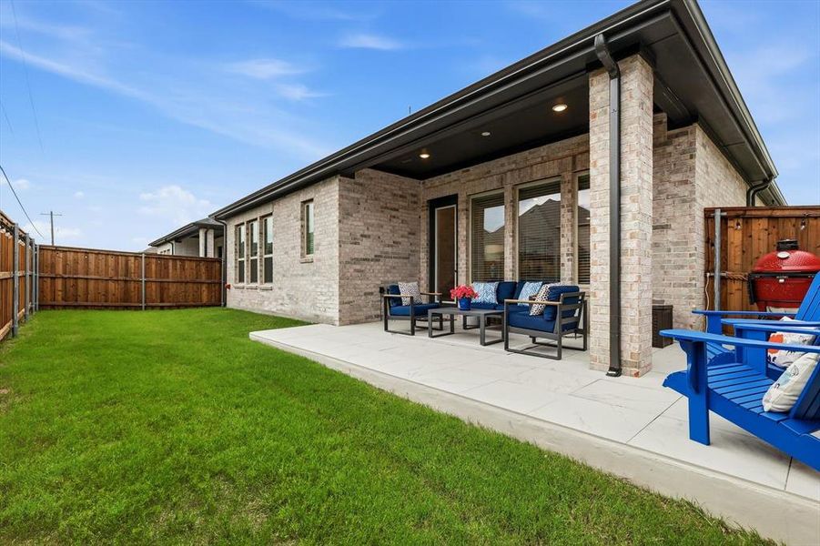 Exterior details and patio area of a home in Estates at Stacy Crossing, McKinney (Image 20).
