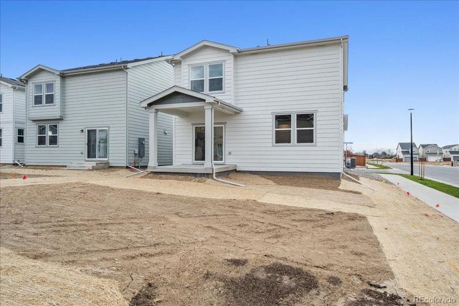 Exterior details and patio area of a home in Farmlore, Brighton (Image 3).