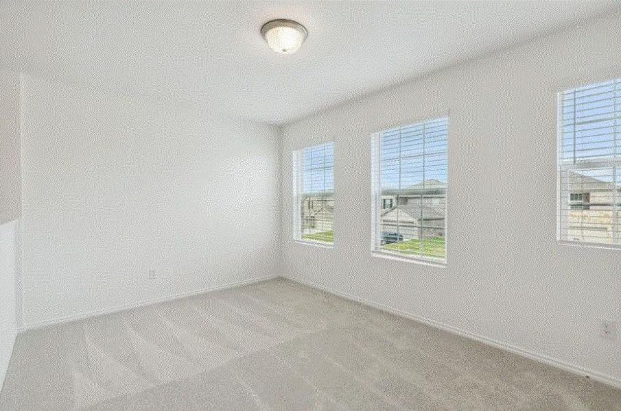 Photo of Pulte home with same floor plan, not of actual home listed.