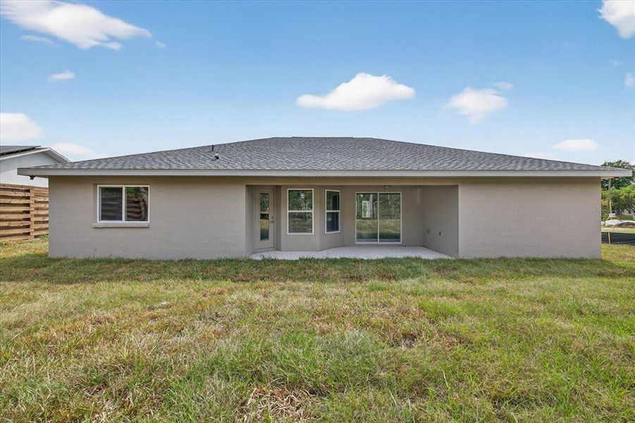 Front exterior of a new home in , Spring Hill, FL, highlighting curb appeal (Image 19).