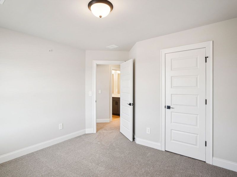 Spacious, unfurnished interior of a new home in Hemingway - Highland Series, Cumming (Image 17).