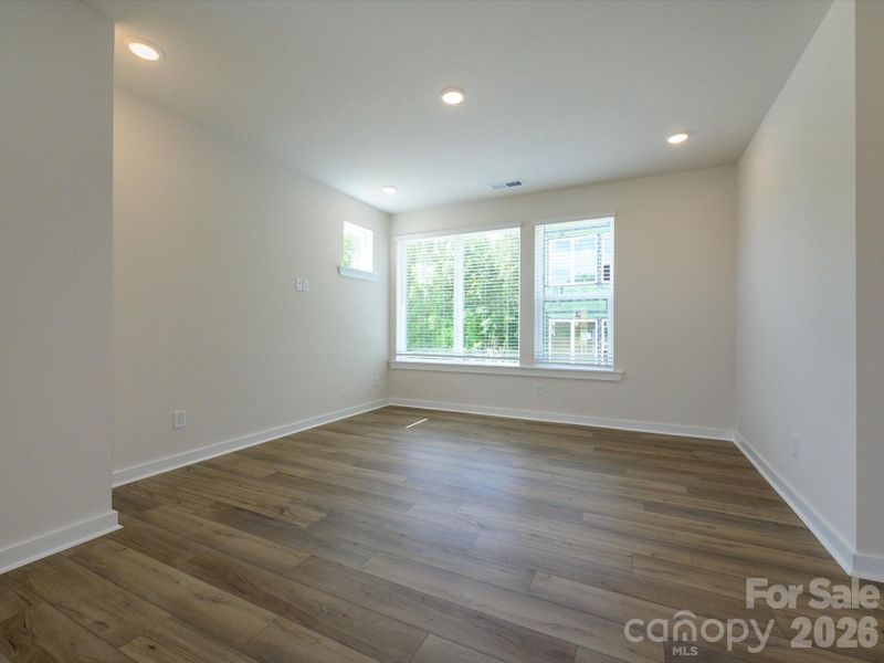 Spacious, unfurnished interior of a new home in Central Living at Craig, Charlotte (Image 28).