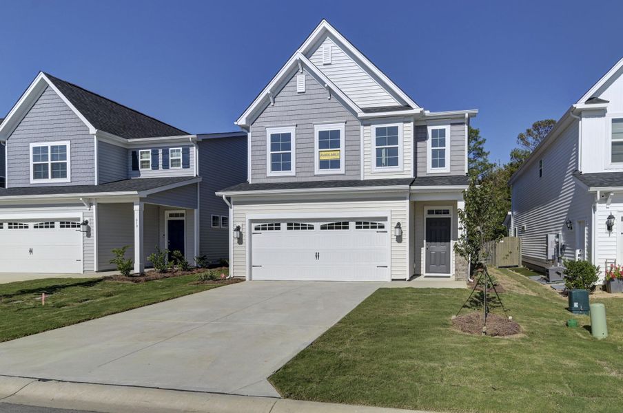 Front exterior of a new home in Ashton Lakes, Lexington, SC, highlighting curb appeal (Image 2).