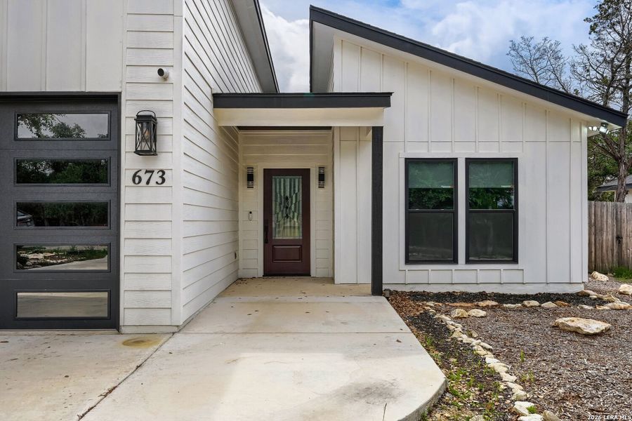 Exterior details and patio area of a home in , Spring Branch (Image 3).