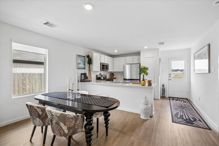 Pleasant well lit dining room, don't you think? Pleasant well lit dining room, don't you think?