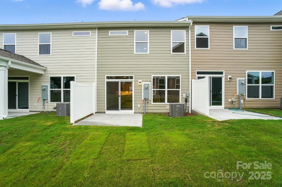Front exterior of a new home in Harrisburg Village Townhomes, Harrisburg, NC, highlighting curb appeal (Image 26). Front exterior of a new home in Harrisburg Village Townhomes, Harrisburg, NC, highlighting curb appeal (Image 26).