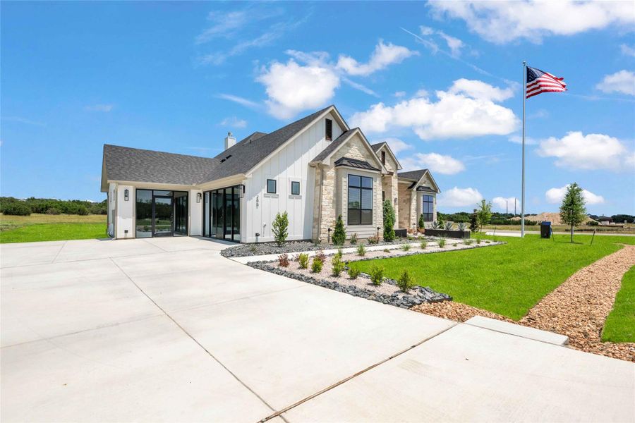 Front exterior of a new home in Daniels Mountain, Georgetown, TX, highlighting curb appeal (Image 20).