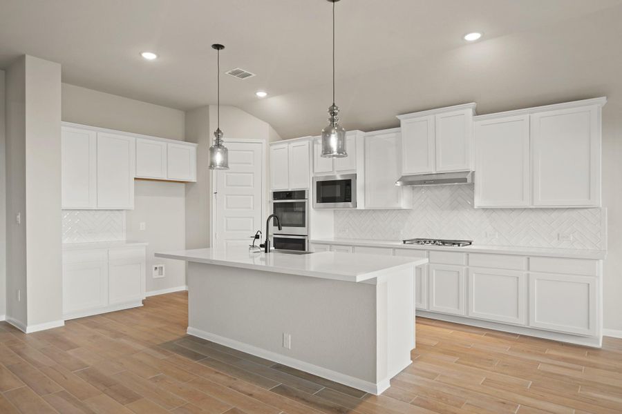 Gourmet island kitchen (*Photo not of actual home and used for illustration purposes only.)