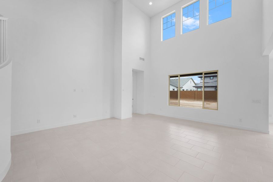 Spacious, unfurnished interior of a new home in Ellsworth Ranch Voyage Collection, Queen Creek (Image 10).