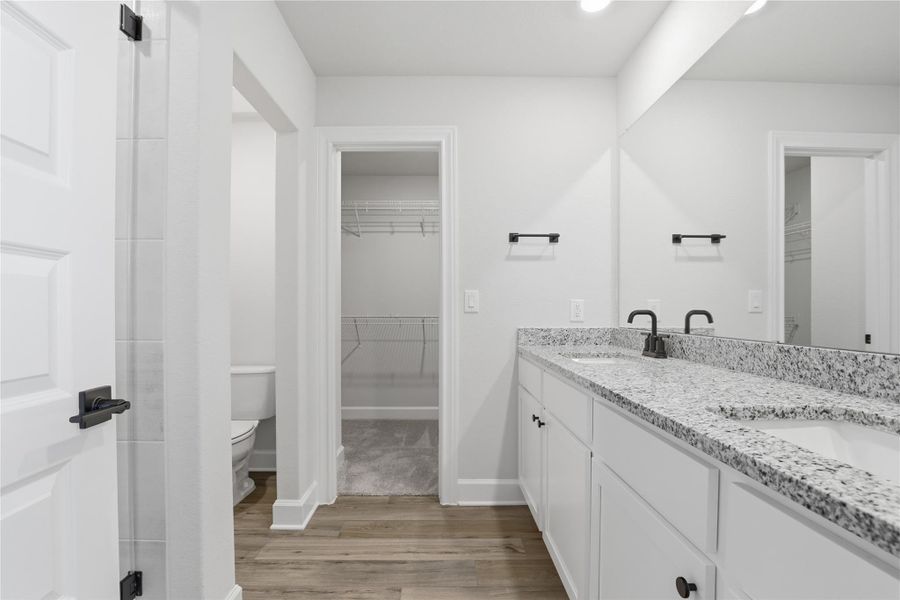 Furnished interior view inside a new home in Whisper Valley, Manor (Image 16).