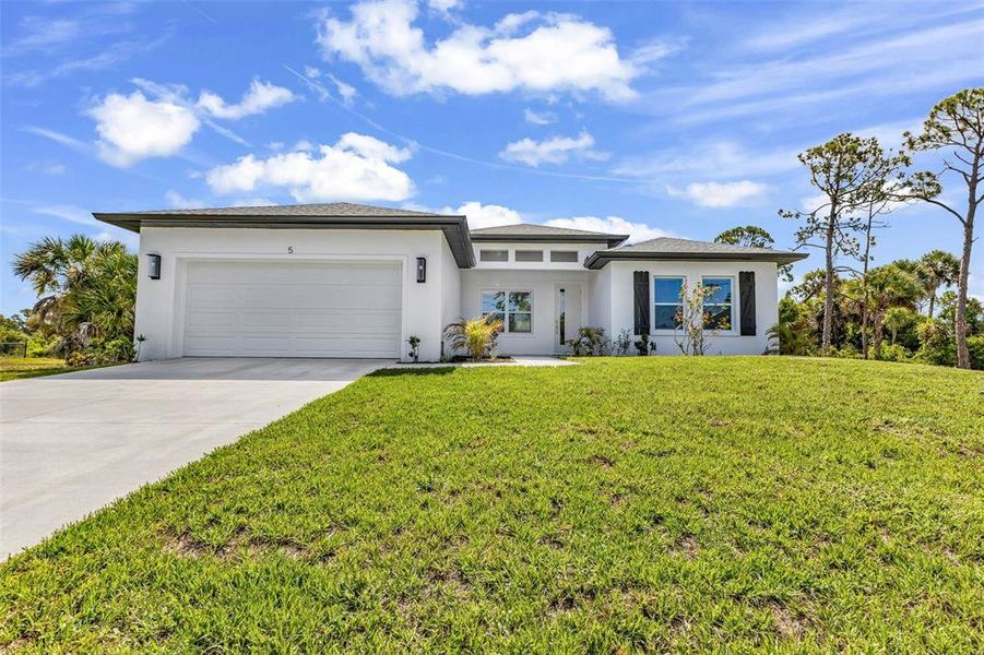 Front exterior of a new home in , Placida, FL, highlighting curb appeal (Image 31).