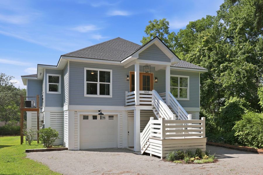 Front exterior of a new home in , Johns Island, SC, highlighting curb appeal (Image 2). Front exterior of a new home in , Johns Island, SC, highlighting curb appeal (Image 2).