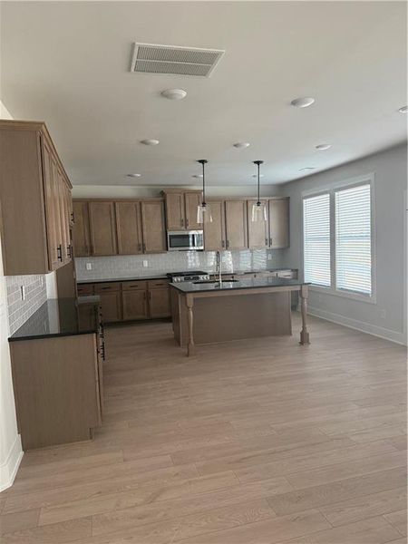 Furnished interior view inside a new home in The Fairways at Mirror Lake, Villa Rica (Image 6).