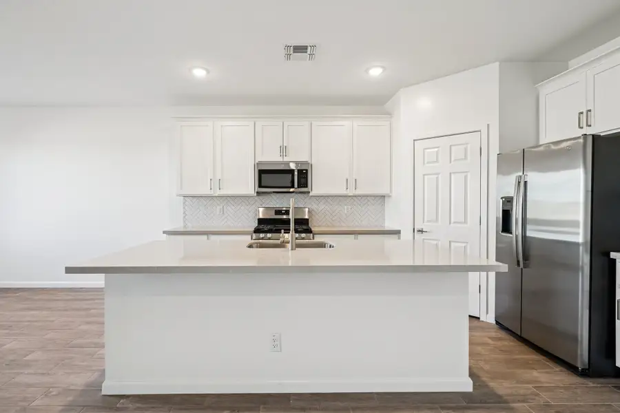 Kitchen featuring the Timeless Collection. Options and finishes may vary by community.