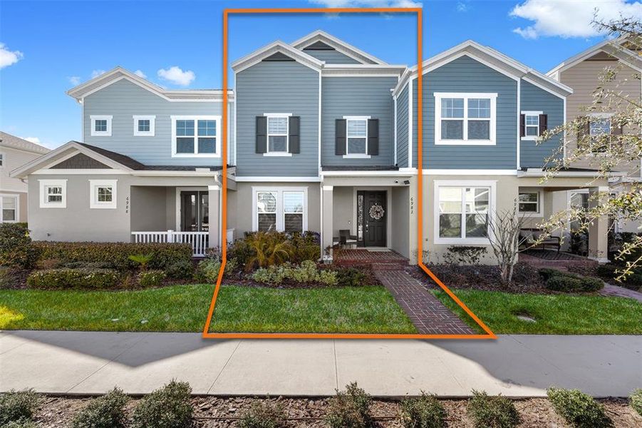 Front exterior of a new home in , Winter Garden, FL, highlighting curb appeal (Image 23). Front exterior of a new home in , Winter Garden, FL, highlighting curb appeal (Image 23).