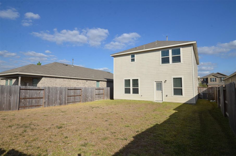 Exterior details and patio area of a home in Mavera, Conroe (Image 13). Exterior details and patio area of a home in Mavera, Conroe (Image 13).