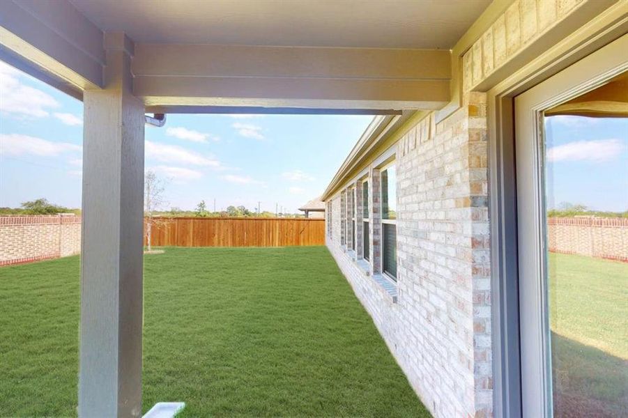 Exterior details and patio area of a home in The Preserve, Justin (Image 22). Exterior details and patio area of a home in The Preserve, Justin (Image 22).