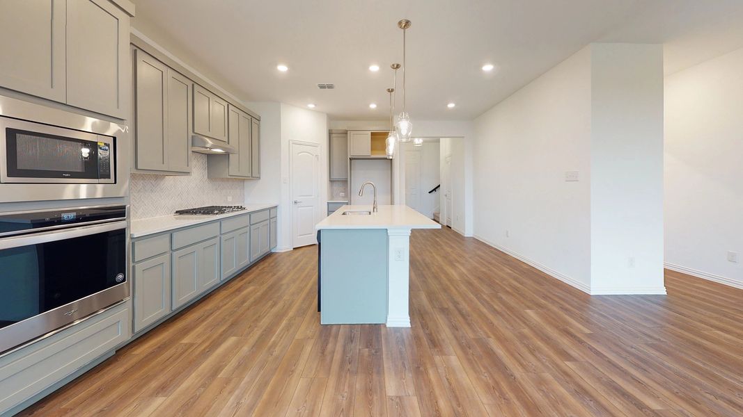 Representative furnished interior of a home built from the Sterling by Ashton Woods in Gateway Parks, Forney (Image 9).