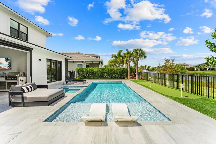 Front exterior of a new home in , Palm Beach Gardens, FL, highlighting curb appeal (Image 21).
