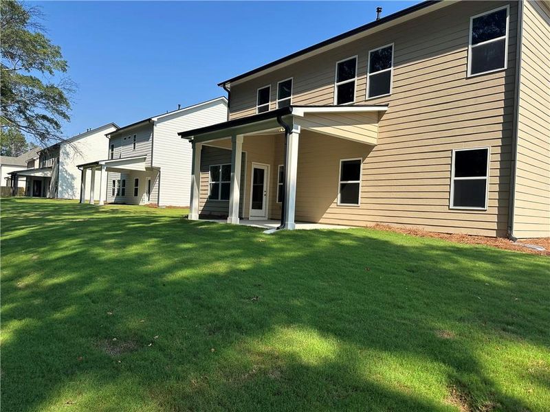 Front exterior of a new home in Rosewood Lake Estates, Hoschton, GA, highlighting curb appeal (Image 43).