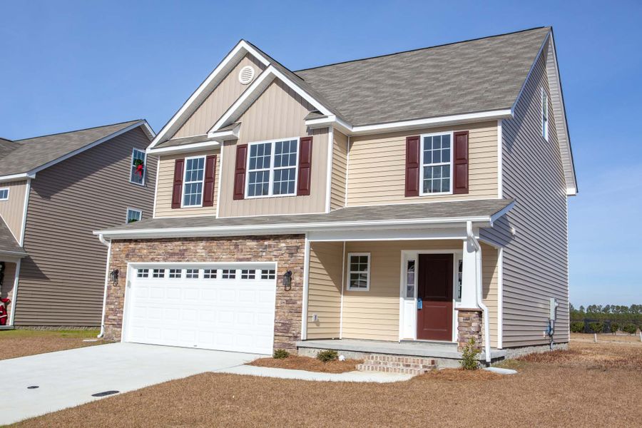 Representative exterior photo of a completed home built from the Rockbridge by Bill Clark Homes in Davenport Farms, Winterville, NC (Image 31).