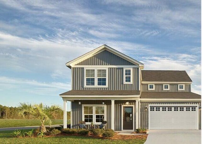 Front exterior of a new home in Tea Farm: Presidents Series, Ravenel, SC, highlighting curb appeal (Image 1).