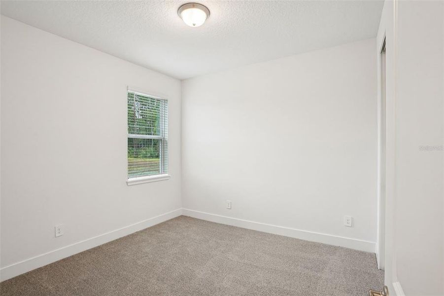 Spacious, unfurnished interior of a new home in Ridgehaven - Signature Series, Ormond Beach (Image 33).