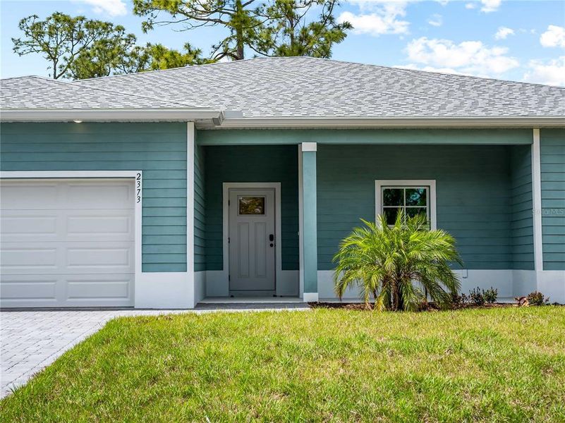 Exterior details and patio area of a home in , North Port (Image 3).