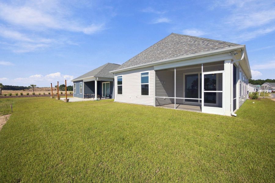 Exterior details and patio area of a home in Coastal Club of the Carolinas, Calabash (Image 24). Exterior details and patio area of a home in Coastal Club of the Carolinas, Calabash (Image 24).