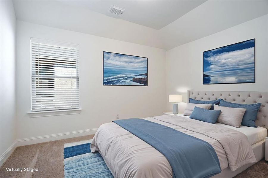 The upstairs layout includes two generous bedrooms connected by a shared bath — great setup for family or visitors.