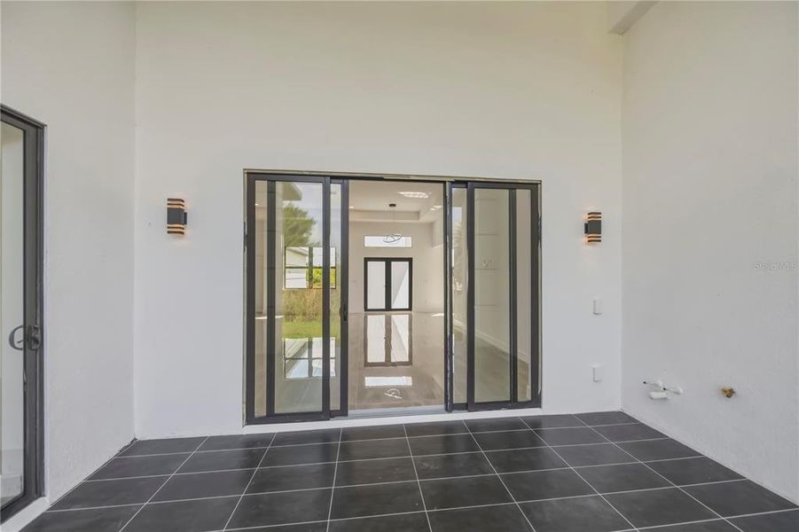 Exterior details and patio area of a home in , Port Charlotte (Image 34).