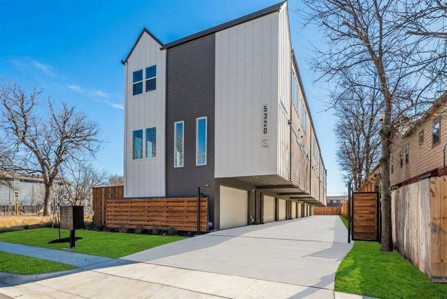 Front exterior of a new home in , Dallas, TX, highlighting curb appeal (Image 25).