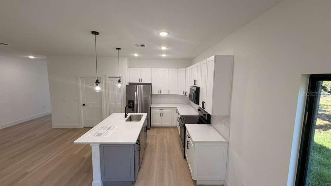 Furnished interior view inside a new home in , North Port (Image 17).