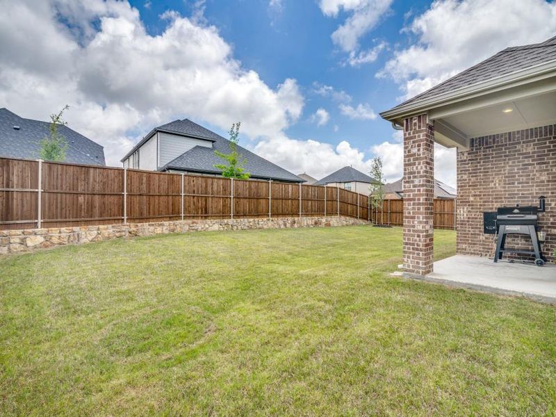 Exterior details and patio area of a home in , Royse City (Image 21).